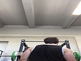 Pumping shoulders at gym